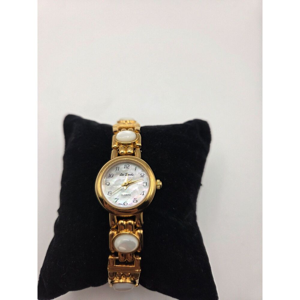 1844.  Vintage Lee Sands Gold Tone and Mother of Pearl Quartz Wristwatch